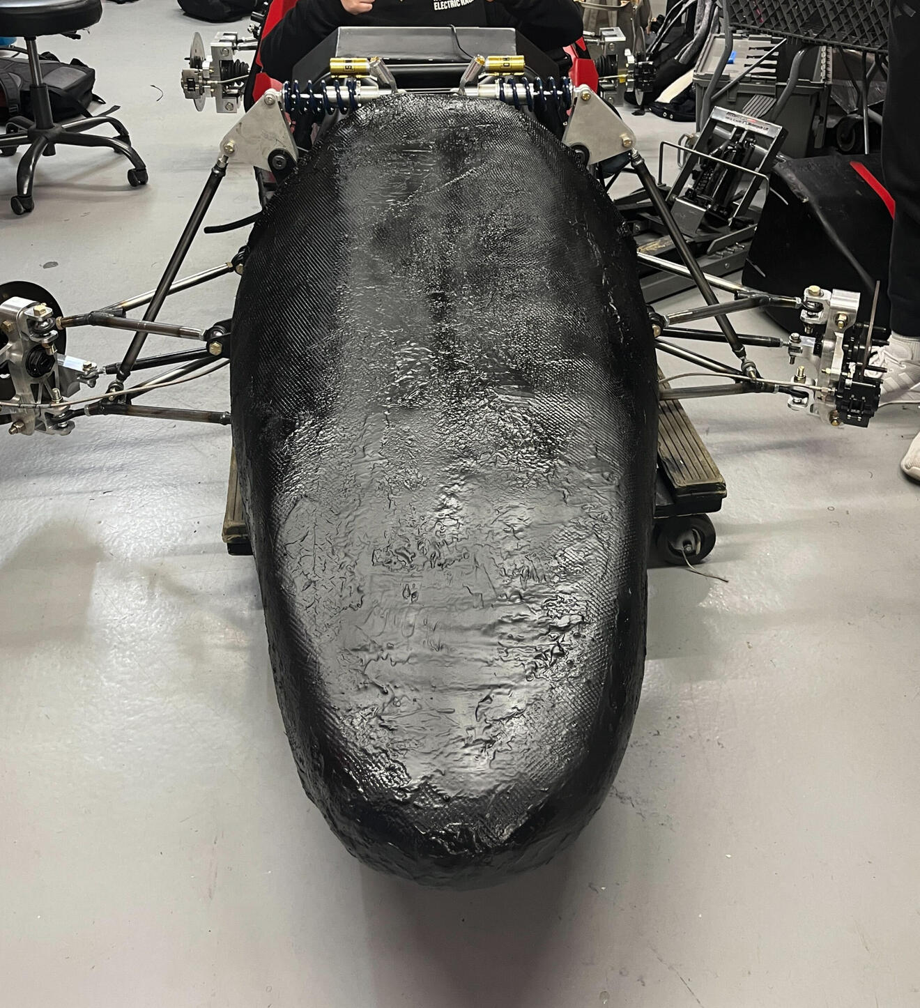 Fibreglass being laid over the bodywork mould