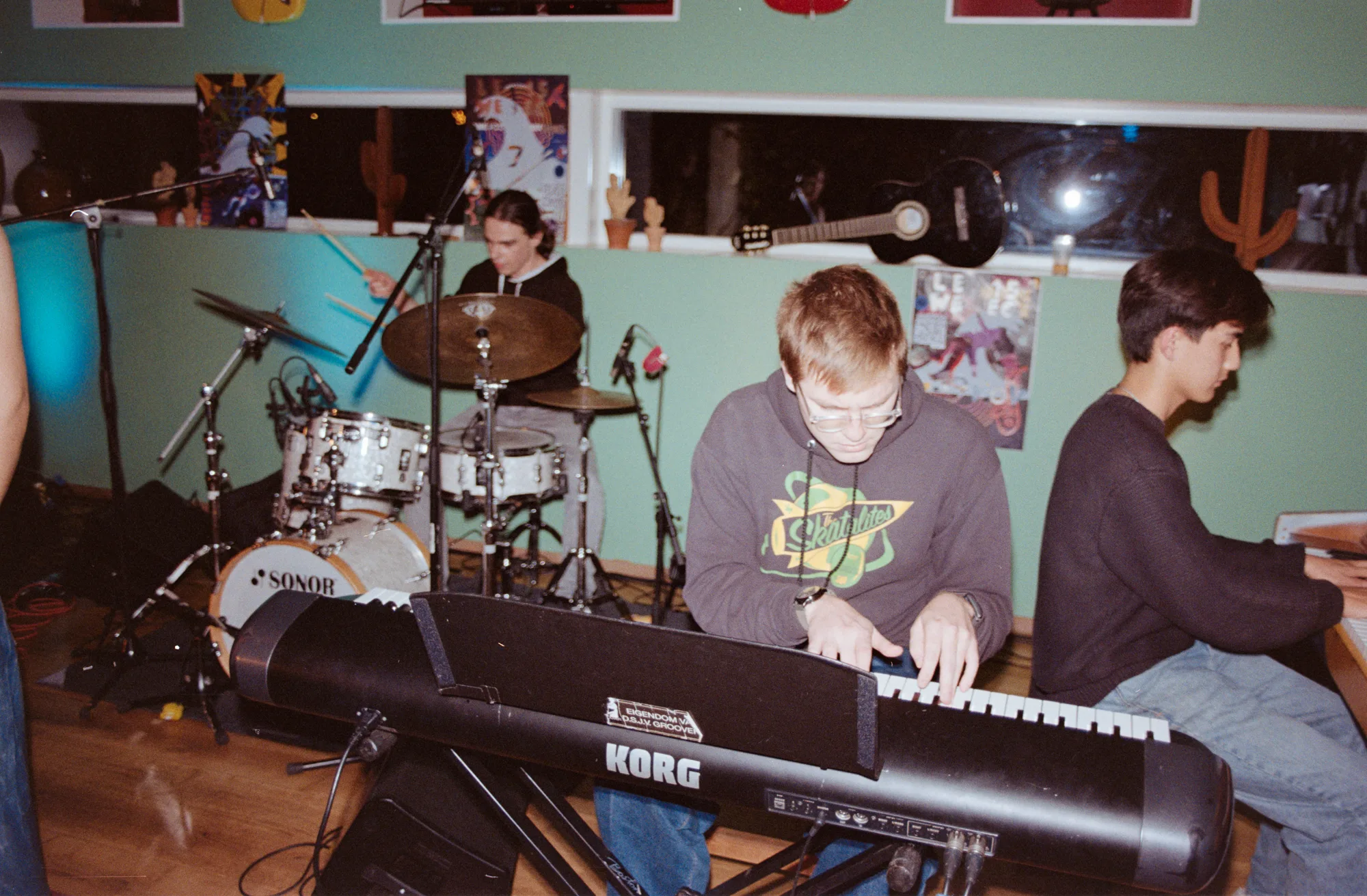 Jack Hansen playing piano with a live band